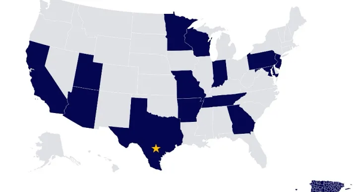 map of the US with some states shaded in blue and the rest in grey, a yellow star placed in the middle of Texas