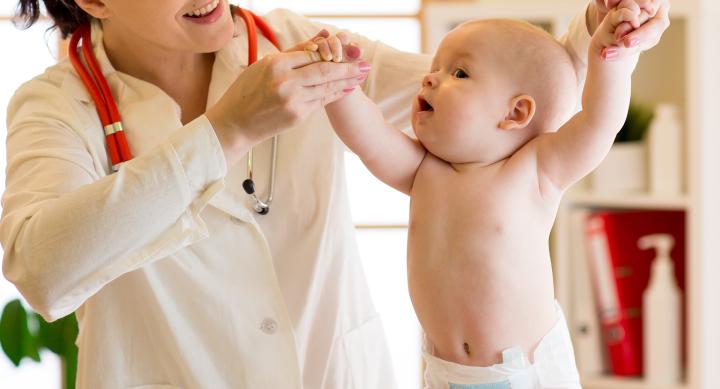 doctor holding baby 